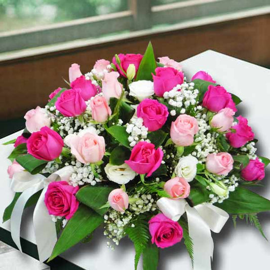 50 Roses Table Arrangement ( 25 Peach & 25 Hot Pink )